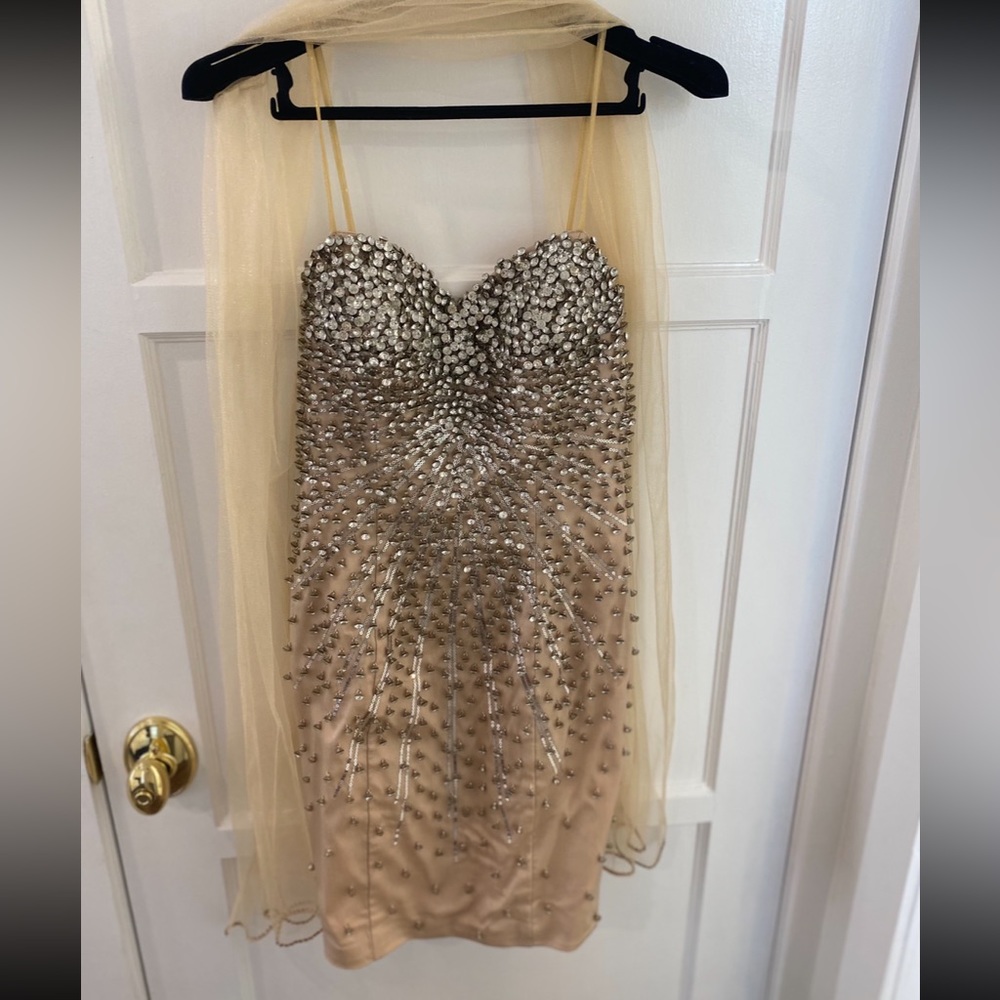 Musani Couture, size 2, shall included